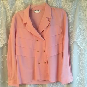 Tailored pink blouse.